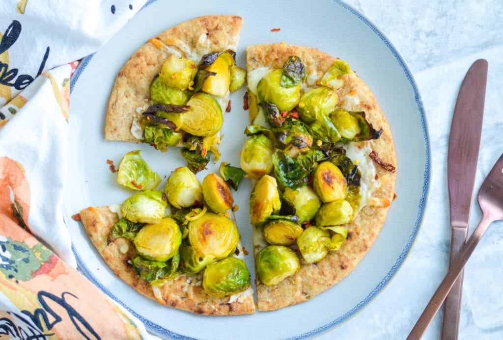 Brussels Sprouts Flatbread on whole wheat naan with mozzarella cheese