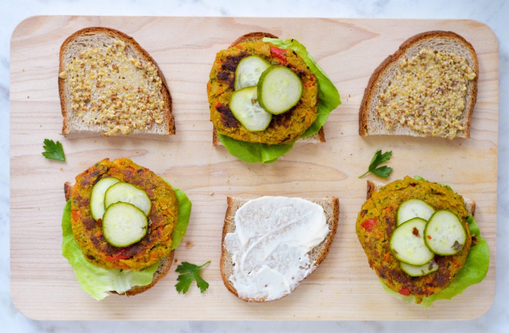3 open faced chickpea veggie burgers on whole grain bread
