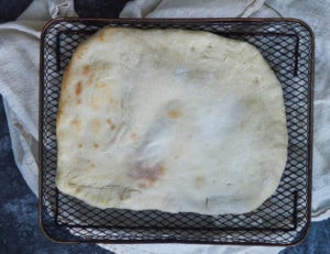 cooked pizza dough