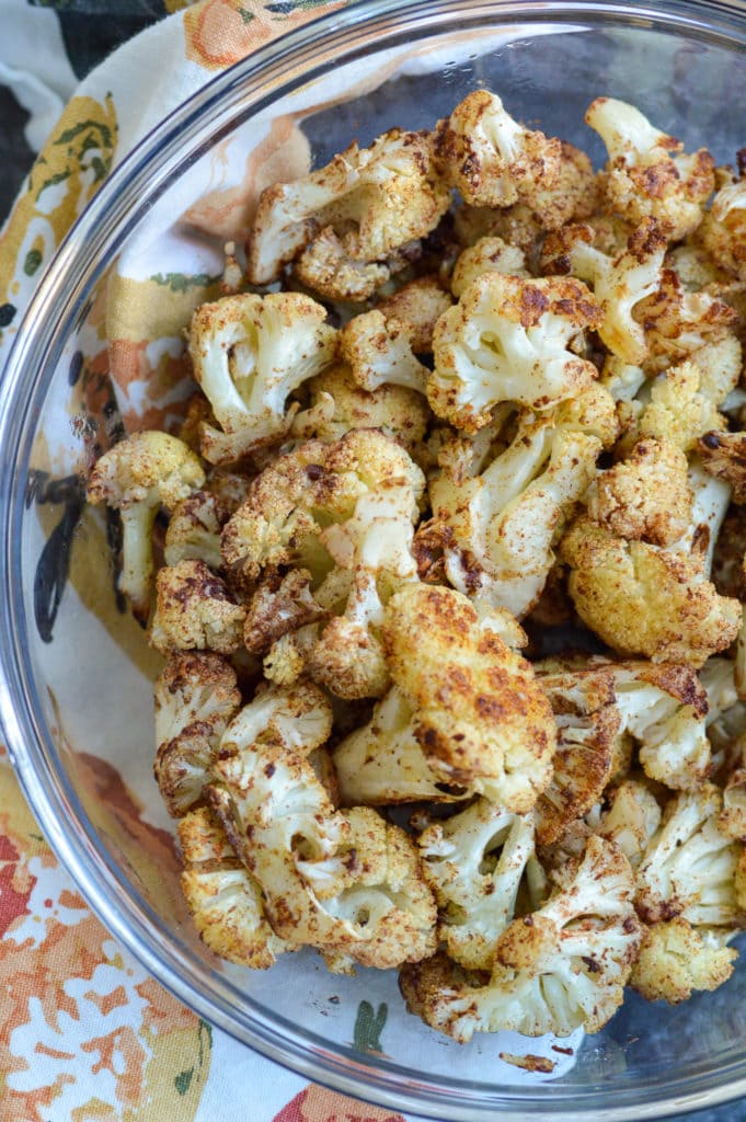 Roasted cauliflower in a clear bowl