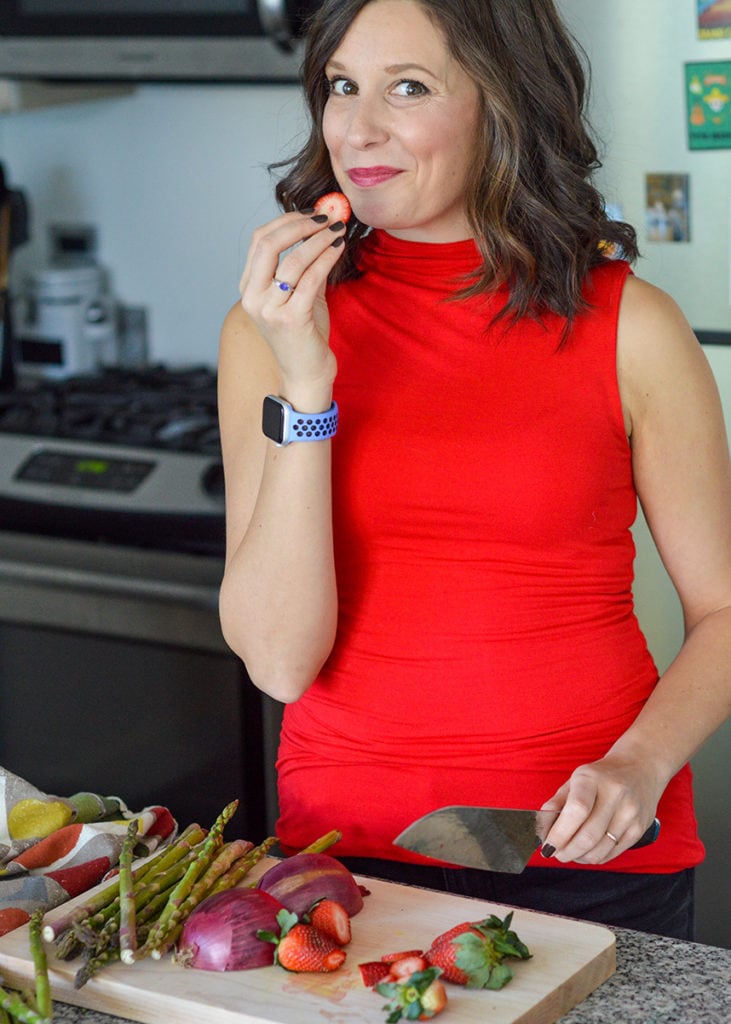 natalie rizzo eating a strawberry