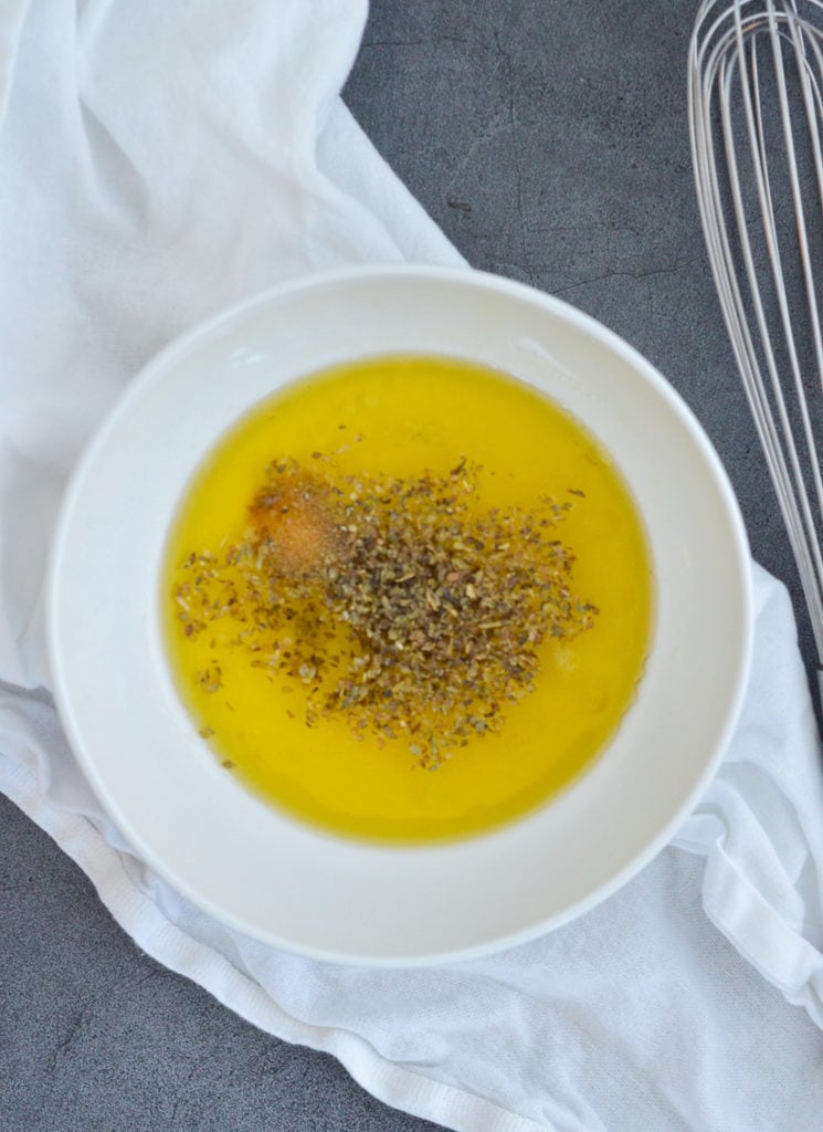 lemon and oregano vinaigrette in a bowl