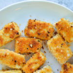 vegan tofu nuggets made with panko breadcrumbs on a white plate