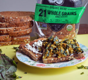 Turmeric Egg Sandwich with Swiss Chard & Feta on Dave's Killer Bread