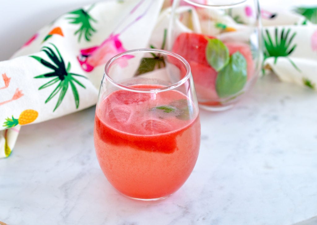 Watermelon Lime Ice Cubes are a great way to flavor water without any added sugar. The perfect refreshing drink for summer. Whip up a batch and store them in your freezer! #watermelon #flavoredwater #noaddedsugar #vegan #hydration