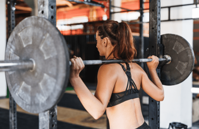 woman lifting weights
